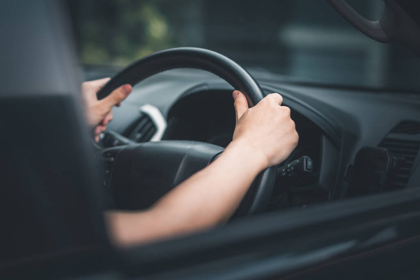 Asian man hand holding steering wheel. - Photo, Image