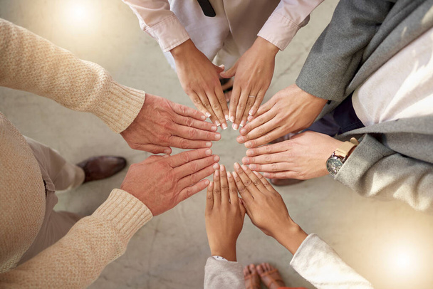 Teamwork, top view or hands of business people in circle for motivation, corporate community or hope together. Collaboration, diversity or support of employees meeting for our vision, growth or goals. - Photo, Image