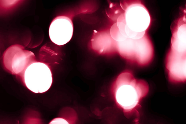 Viva magenta blurred lights abstract background. Holiday defocused bokeh - Foto, imagen