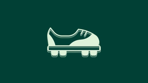 Άσπρα παπούτσια ποδοσφαίρου εικονίδιο απομονώνονται σε πράσινο φόντο. Μπότες ποδοσφαίρου. Αθλητική ποδοσφαιρική προστασία. 4K Γραφική κίνηση κίνησης βίντεο. - Πλάνα, βίντεο