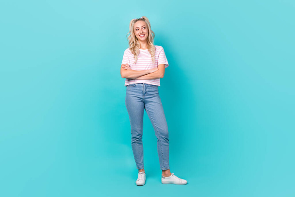 Full body portrait of gorgeous cheerful lady folded arms look empty space isolated on turquoise color background. - Valokuva, kuva