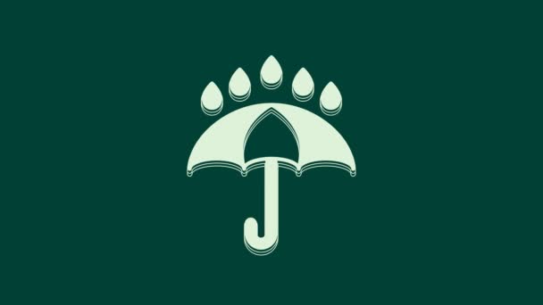Witte paraplu en regendruppels pictogram geïsoleerd op groene achtergrond. Waterdicht icoon. Bescherming, veiligheid, beveiligingsconcept. Waterbestendig symbool. 4K Video motion grafische animatie. - Video