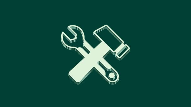 White Crossed Hammer und Schraubenschlüssel Symbol isoliert auf grünem Hintergrund. Hardware-Tools. 4K Video Motion Grafik Animation. - Filmmaterial, Video