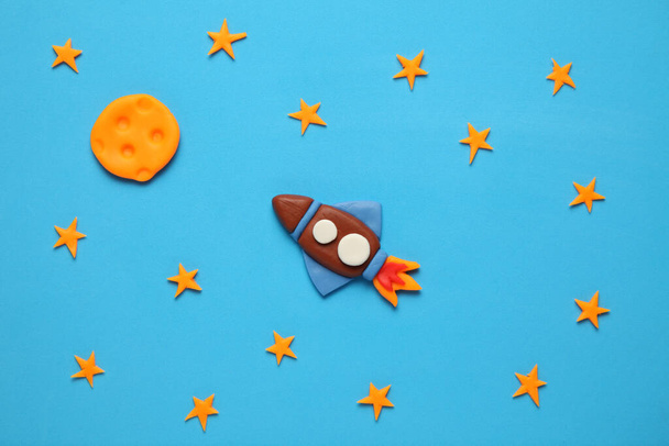 Kid (child) rocket in space, adventure and science. Stars, and moon. Plasticine art, cartoon. - 写真・画像