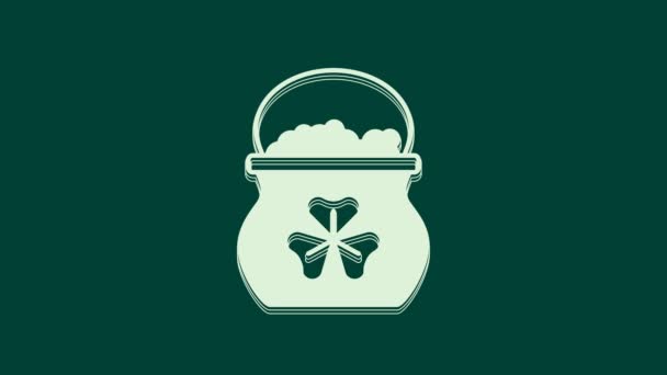 Witte pot met gouden munten pictogram geïsoleerd op groene achtergrond. Fijne Saint Patricks dag. Nationale Ierse feestdag. 4K Video motion grafische animatie. - Video