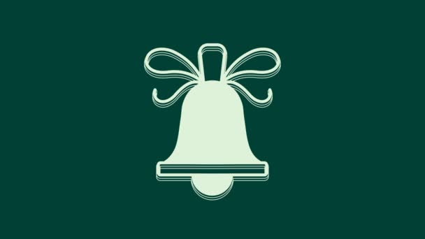 White Merry Christmas ringing bell icon isolated on green background. Alarm symbol, service bell, handbell sign, notification. 4K Video motion graphic animation. - Footage, Video
