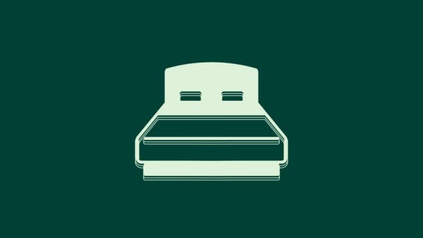 Białe Duże łóżko dla dwóch lub jednej osoby ikona izolowane na zielonym tle. 4K Animacja graficzna ruchu wideo. - Materiał filmowy, wideo