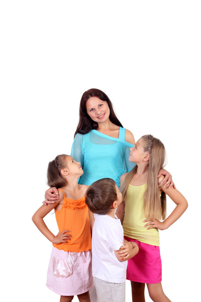 Mother with her three children in studio - Photo, Image