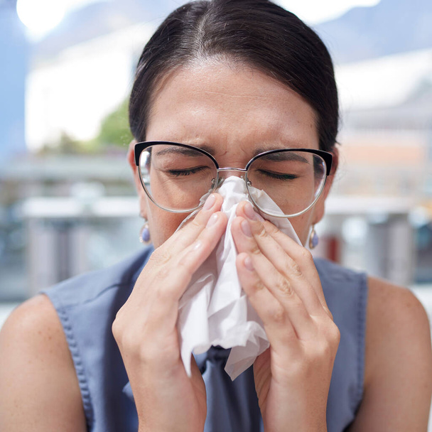 Entrepreneur, flu and woman with tissue, allergy and manager with glasses, sickness and safety. Female employee, business owner and administrator with toilet paper, blowing nose or fever in workplace. - Foto, afbeelding