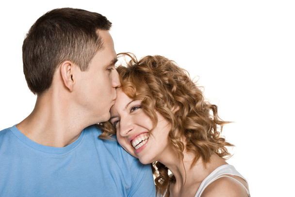 Beautiful young couple kissing - Foto, afbeelding