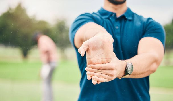 Golf, sports and man stretching hand on course for game, practice and training for competition. Professional golfer, fitness and hands of male athlete warm up for exercise, golfing and recreation. - Photo, image