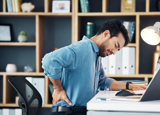 Back pain, business man and office stress of muscle injury, health risk and backache on desk chair. Uncomfortable worker, spine problem and posture of body, scoliosis and fatigue of corporate burnout. - Foto, immagini