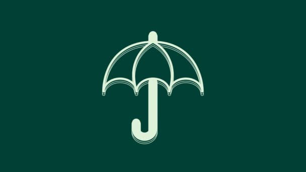 Bílý deštník ikona izolované na zeleném pozadí. Pojištění. Vodotěsná ikona. Ochrana, bezpečnost, koncepce zabezpečení. Grafická animace pohybu videa 4K. - Záběry, video