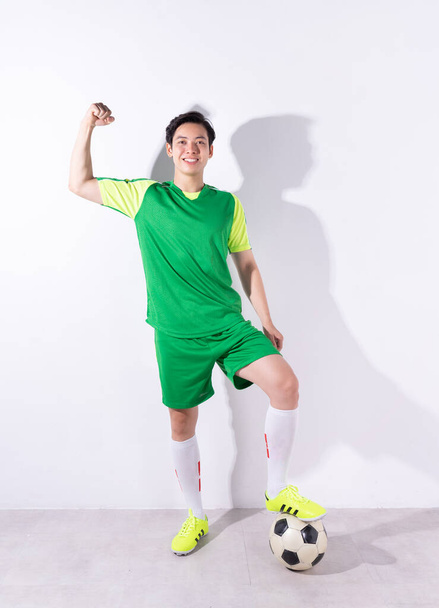 Image of young Asian football player - Photo, Image