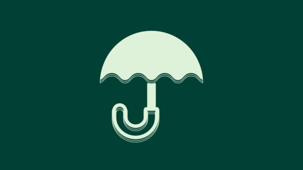 Белый классический элегантно раскрытый значок на зеленом фоне. Символ защиты от дождя. Видеографическая анимация 4K. - Кадры, видео
