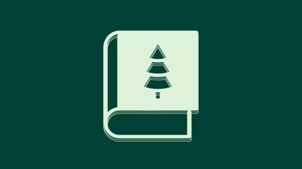 Fehér karácsonyi könyv borító vagy szórólap sablon ikon elszigetelt zöld alapon. Boldog karácsonyt és boldog új évet! 4K Videó mozgás grafikus animáció. - Felvétel, videó