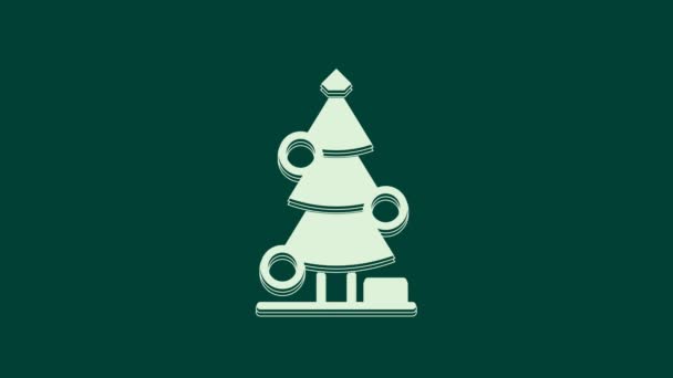 Fehér karácsonyfa dekoráció ikon elszigetelt zöld háttér. Boldog karácsonyt és boldog új évet! 4K Videó mozgás grafikus animáció. - Felvétel, videó