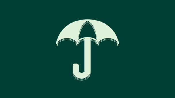 Witte paraplu pictogram geïsoleerd op groene achtergrond. Verzekeringsconcept. Waterdicht icoon. Bescherming, veiligheid, beveiligingsconcept. 4K Video motion grafische animatie. - Video