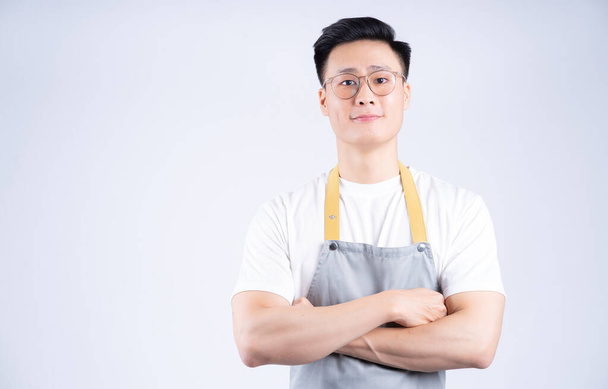Obrázek mladého asijského číšníka na pozadí - Fotografie, Obrázek