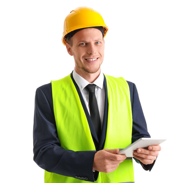 Male engineer with tablet computer on white background - Foto, afbeelding