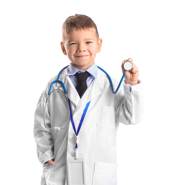 Cute little doctor with stethoscope on white background - Photo, Image