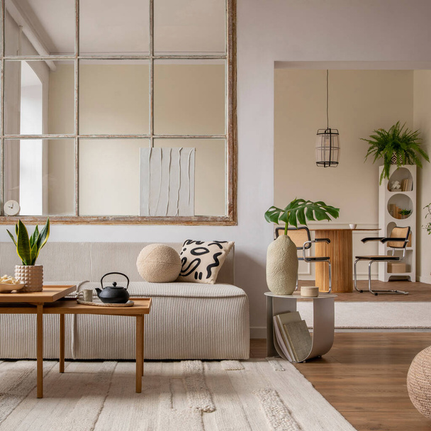 Creative composition of living room interior with modular sofa, beige rug, plants, vase with green leaves, pouf, stylish coffee table, big window, lamp and personal accessories. Home decor. Template.  - Φωτογραφία, εικόνα