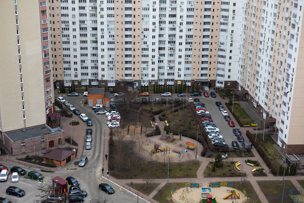 Car parking lot near old house buildings, Aerial view. Living sector - Foto, imagen