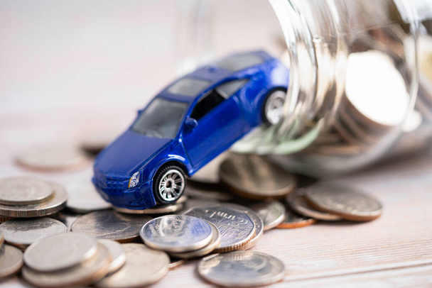 Car and coins, Car loan, Finance, saving money, insurance and leasing time concepts. - Zdjęcie, obraz