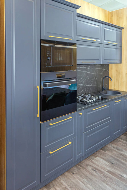 Black Microwave and Conventional Oven Built in Modern Kitchen - Zdjęcie, obraz