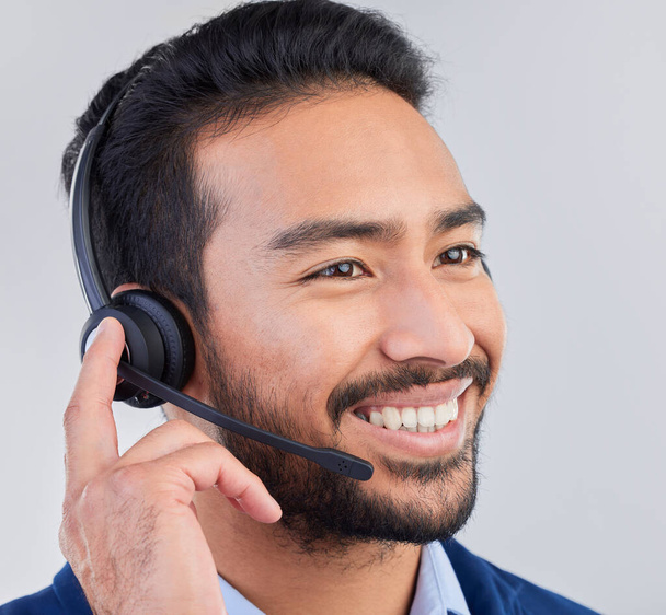 Call center, microphone and face of man happy for communication, consulting and crm networking. Contact us, customer support mockup and male consultant smile in studio for help, service and sales. - Foto, immagini