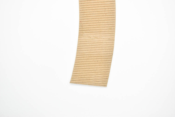 closeup brown paper cardboard texture on white background - Zdjęcie, obraz