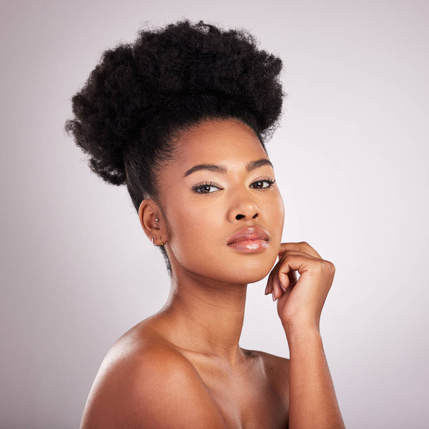 Skincare, beauty and portrait black woman with confidence, white background and cosmetics product. Health, dermatology and natural makeup, African model in studio for healthy skin care and wellness - 写真・画像