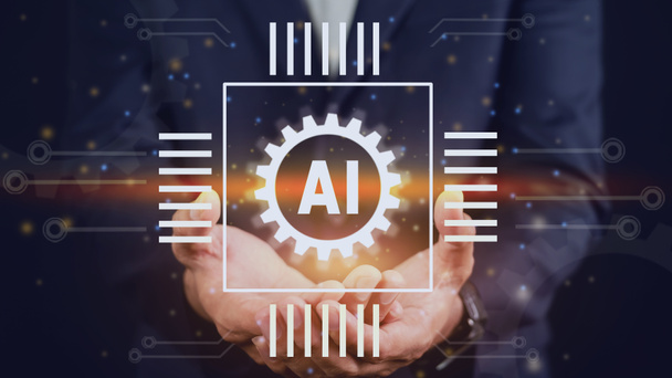 Un homme d'affaires tenant une puce IA. Intelligence artificielle technologie numérique connexion informatique et cyberscience - Photo, image