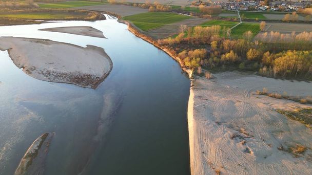 water emergency and drought  due to lack of rain due to global warming  - Drone aerial view of dry river with scarcity of water in Lombardy Pavia - Po the biggest  river in Italy  - Фото, зображення