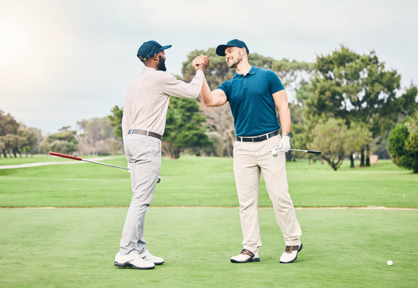 Friends, men and shaking hands on golf course for sports, trust or partnership on grass field together. Golfing, collaboration and happy people handshake for good match, game or competition outdoors - Photo, Image