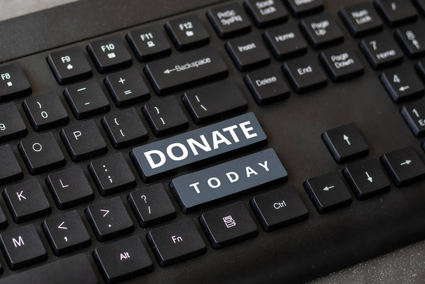 Segno di scrittura a mano Donare, Business idea dare soldi o beni per una buona causa, ad esempio in beneficenza o persone - Foto, immagini