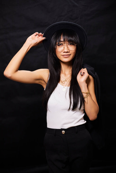 Portrait of beautiful Asian women are cool and confident in casual clothes over white background. People lifestyle concept. Mock up copy space. Fashion model. attractive elegant woman. - Foto, Imagen