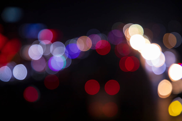Színes Defocus Absztrakt bokeh fény hatások az éjszaka fekete háttér textúra - Fotó, kép