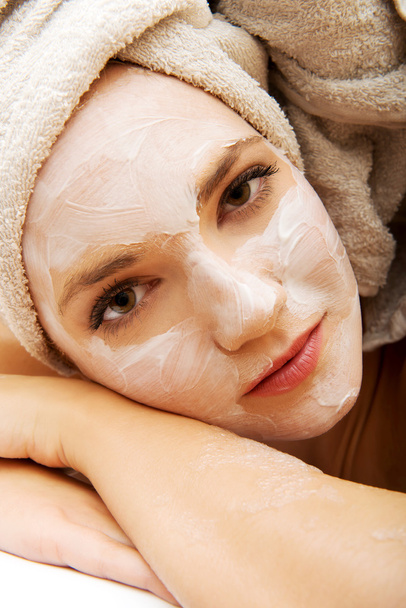 Woman relaxing with face mask. - Zdjęcie, obraz