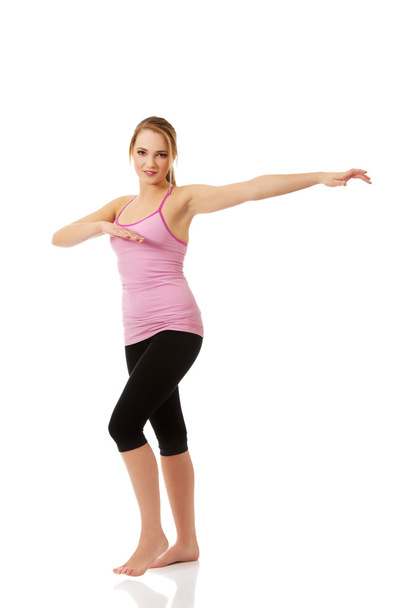 Young woman doing aerobic exercise. - Valokuva, kuva