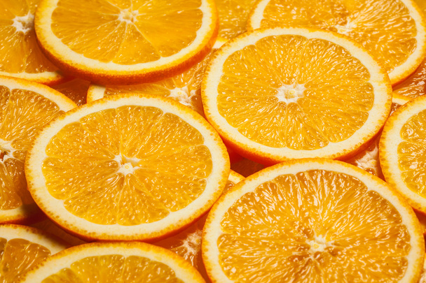 Colorful orange fruit slices - Foto, Imagen