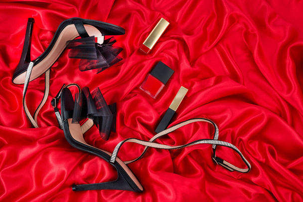  high heel shoes  on a red background - Fotó, kép