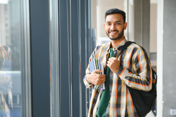 Happy indian male student at the university. - Fotoğraf, Görsel