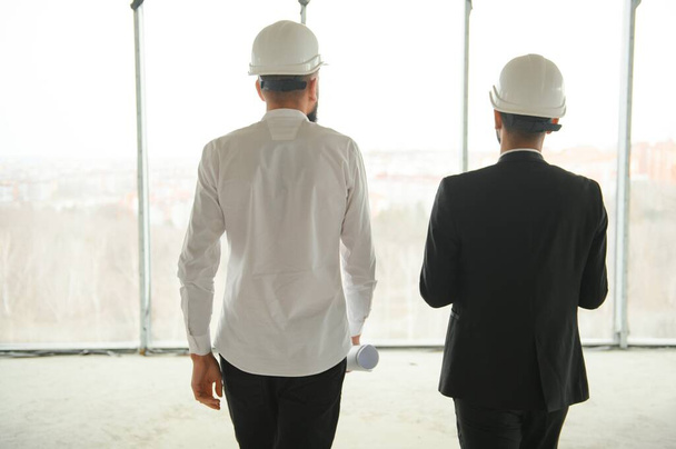 two multiracial business man construction site engineer. - 写真・画像