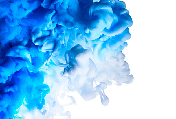 Color drop of blue and white paint underwater abstract blur background - Fotoğraf, Görsel