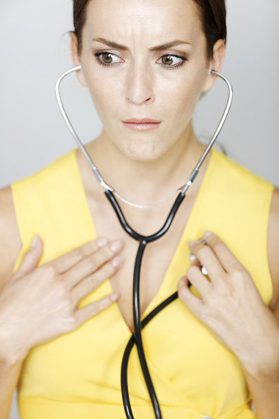 Kobieta lekarz z stetoskop martwi - Zdjęcie, obraz