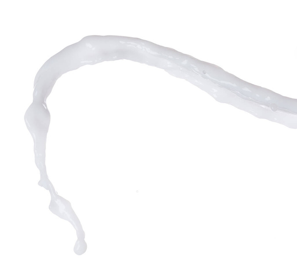 Milk yogurt white water droplet shape form fly splashing. Milk lotion pour float in mid air. Milk moisturizer explosion throw fluttering. White background isolated high speed shutter freeze motion - Photo, Image