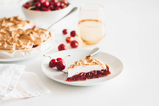 Plate with tasty cherry pie on white background. Top view. Front view - Zdjęcie, obraz