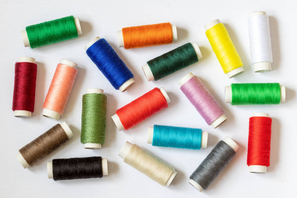 Multicolored threads. Threads on a light background. - Fotoğraf, Görsel