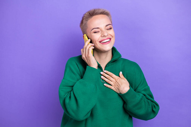 Photo of funny girl laughing carefree touch chest listen her opponent contact online phone call funny joke comic isolated on violet color background. - Fotoğraf, Görsel